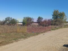 Sabareni, teren rezidential 6290 mp, cu 52m FS, utilitati in apropiere