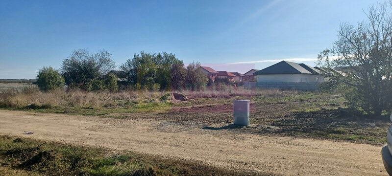 Sabareni, teren rezidential 6290 mp, cu 52m FS, utilitati in apropiere